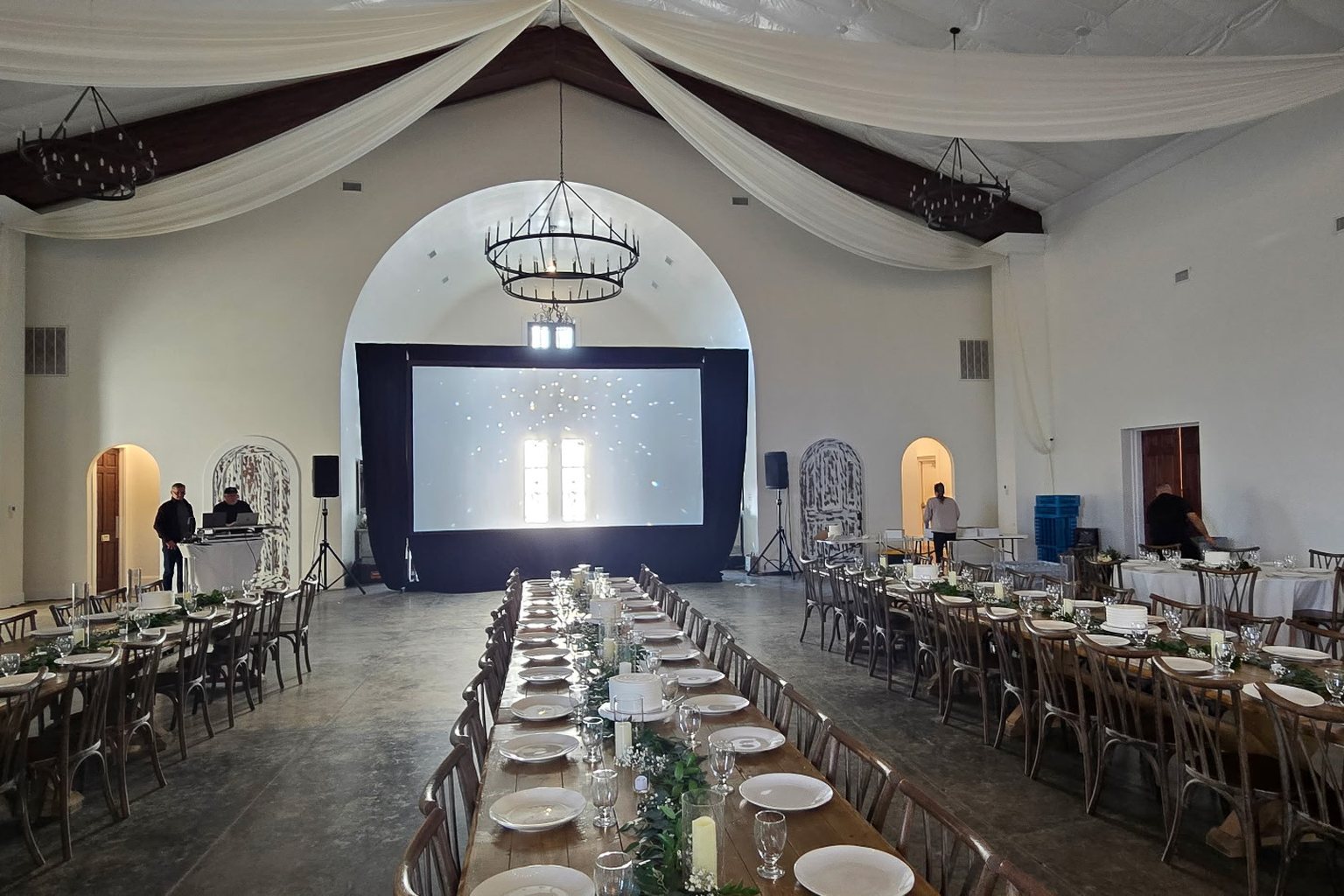 Private dinner celebration with a projection screen and sound in a draped hall at 14TENN, Nashville, AV by Nashville Visual